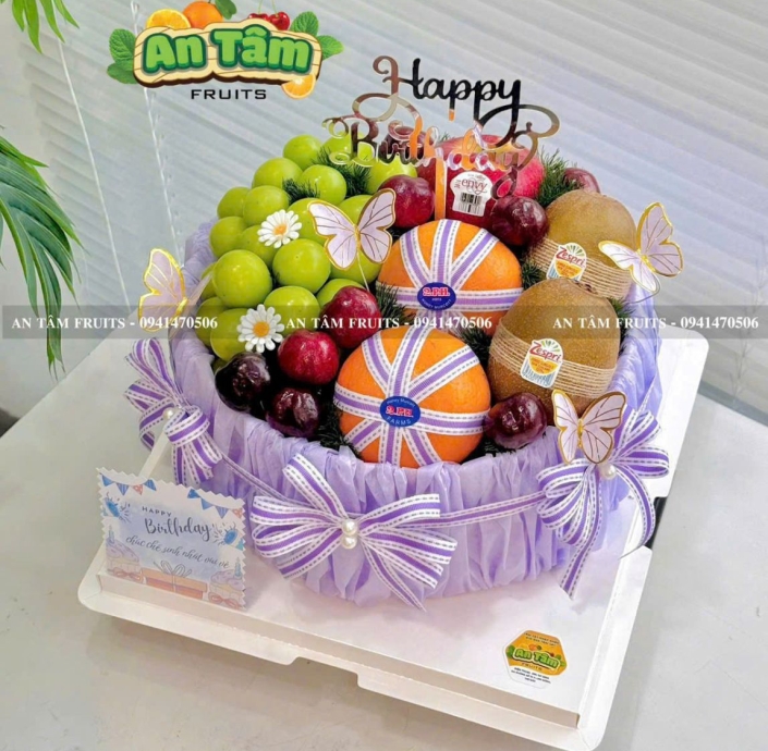 BÁNH KEM TRÁI CÂY TONE TÍM MIX TRÁI CÓ HỘP ĐỰNG MICA TRONG SUỐT
