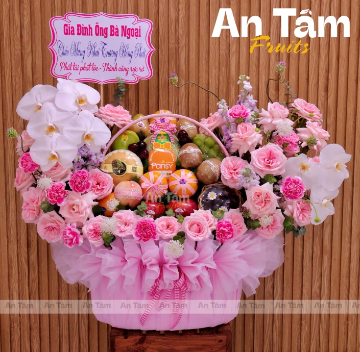 GIỎ TRÁI CÂY TONE HỒNG PHỐI HOA CHÚC MỪNG KHAI TRƯƠNG 