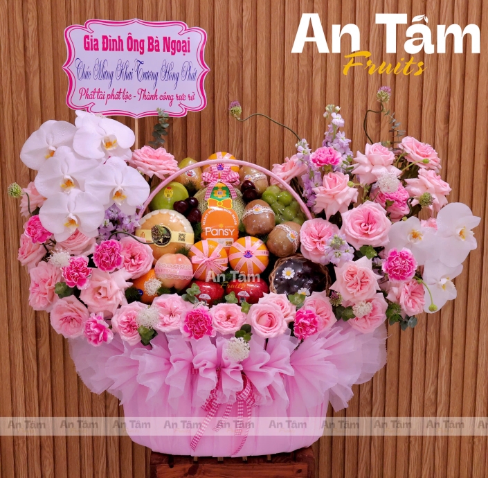 GIỎ TRÁI CÂY TONE HỒNG PHỐI HOA CHÚC MỪNG KHAI TRƯƠNG 